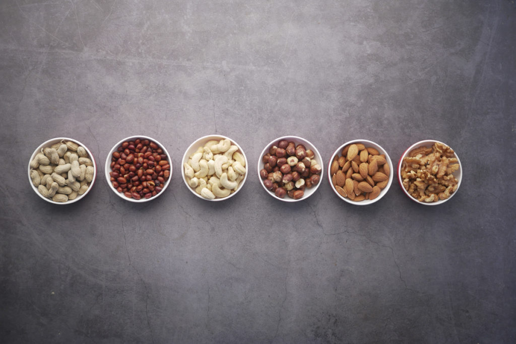 Line of nuts in bowls