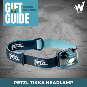 Petzl headlamp on gray background.